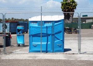 wheelchair accessible porta potty with a hand washing